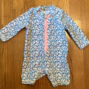 Long sleeve infant swimsuit.